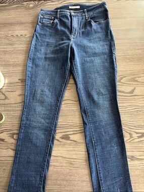 Levi's 721 High Rise Dark Blue Skinny Jeans with Subtle Fading